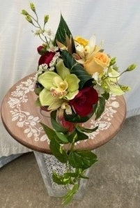 Custom bouquet at the request of client's color preference. Designed for a ground memorial celebrating a beloved father and hero.  Measures approximately 9" x 11" x 14" 